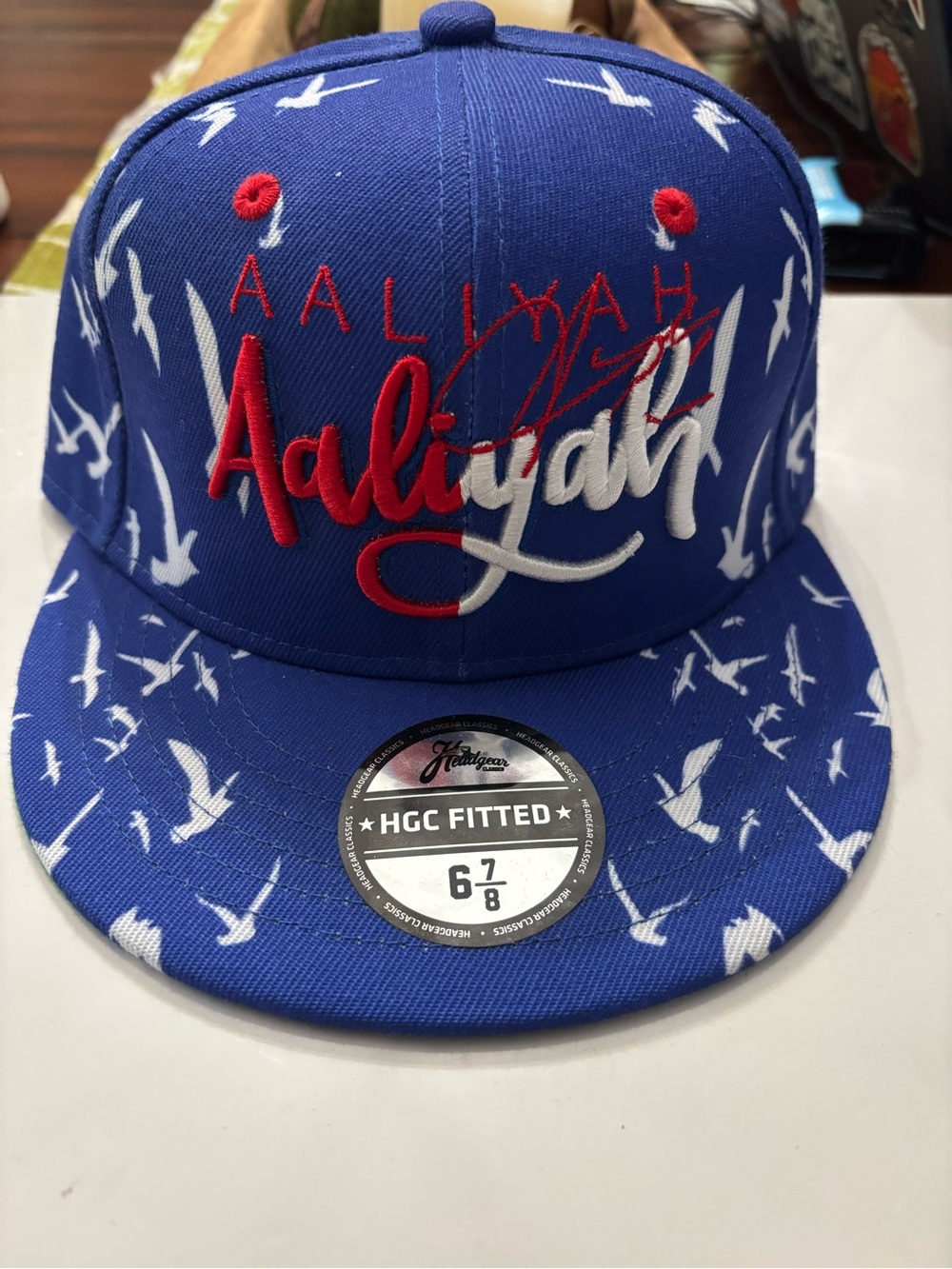 Nostalgia Aaliyah Royal Blue Fitted Cap with White Bird Print and Red Embroidery